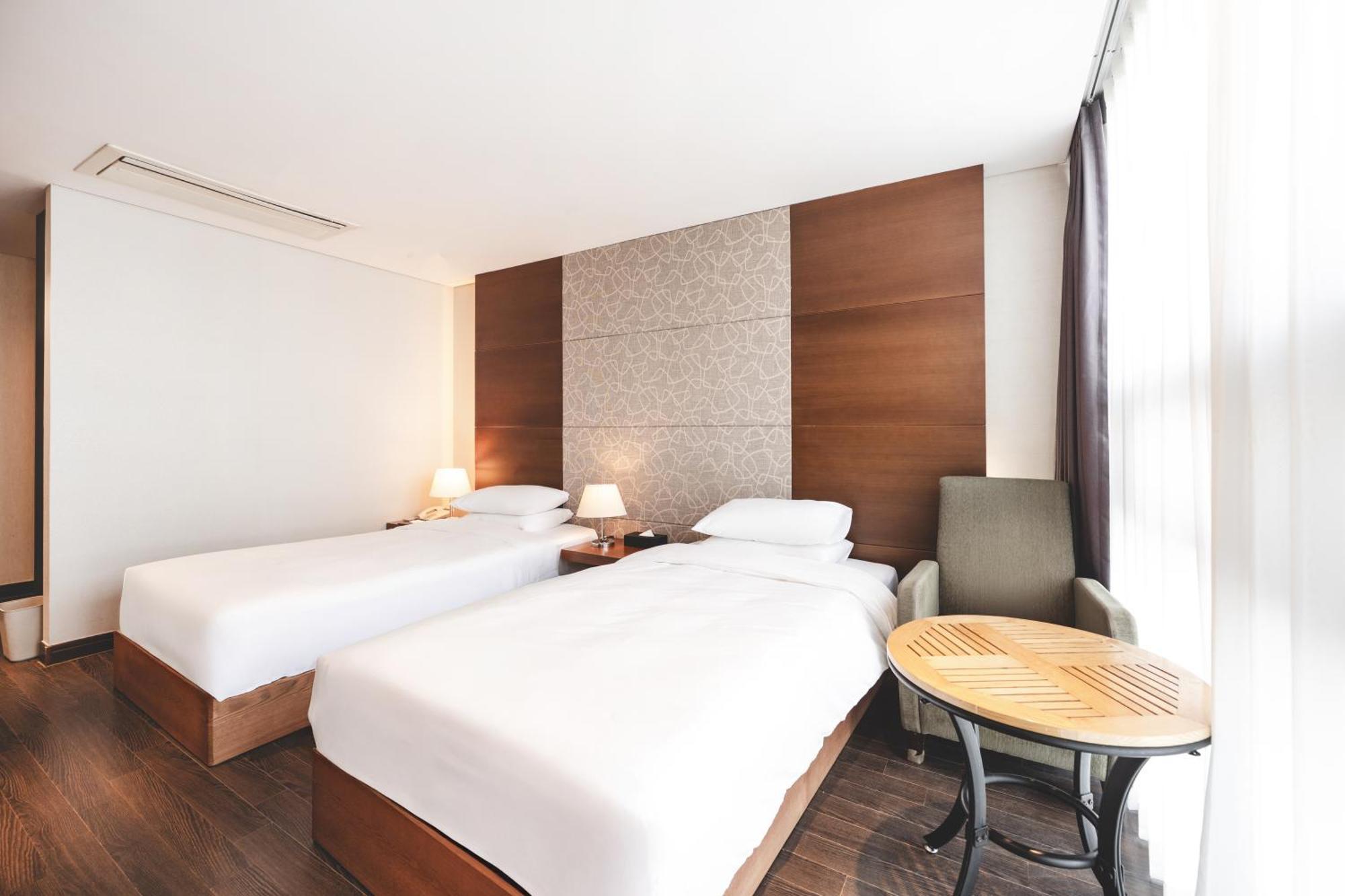 Sunset Hotel Puszan Szoba fotó
